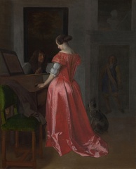 OCHTERVELT JACOB WOMAN STANDING AT HARPSICHORD MAN SEATED BY HER LO NG